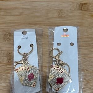 Mint Gold and Red Card Holder Keychain NWT
You get two of them